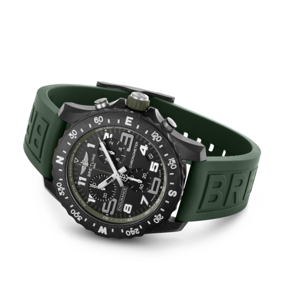 Breitling Endurance Pro, Green shown laying on the side of its case with the crown pointed up.